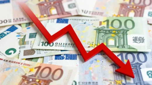A dramatic financial graph showing a sharp decline, with international currencies in the background, conveying a sense of urgency and concern.