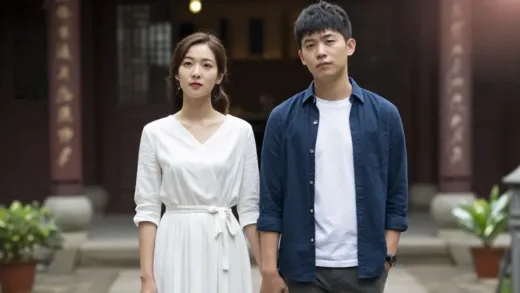 A young couple in casual clothes standing in front of a blurred traditional wedding venue, looking thoughtful and independent. They are holding hands, with a subtle glow of modern life around them. The atmosphere is thoughtful, not sad, showing a confident decision.