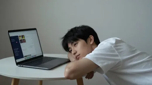 A young Chinese person lying down comfortably in a minimalist room, with soft lighting. On a nearby table, there's a laptop showing social media with "Tangping" related content. The atmosphere is peaceful but with a subtle hint of contemplation.