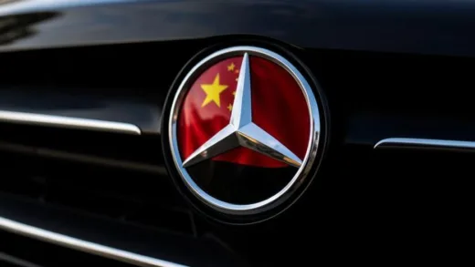 A dramatic close-up of a Mercedes-Benz hood emblem with a Chinese flag subtly reflected in the shiny surface, symbolizing the connection between German luxury and Chinese influence.