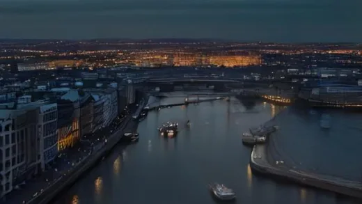 Cinematic aerial view of Dublin city center at dusk, glowing modern office towers along the River Liffey, while a young Irish family carrying suitcases walks away from the city toward a dark suburban horizon, dramatic contrast between wealth and displacement, photorealistic