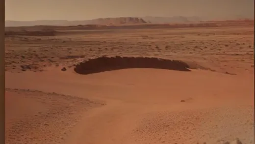 Wide panoramic view of the real Martian surface captured by a NASA rover, reddish-orange rocky terrain with sand dunes and wheel tracks, distant mountains on the horizon, thin dusty atmosphere, photorealistic space exploration photography, dramatic natural lighting